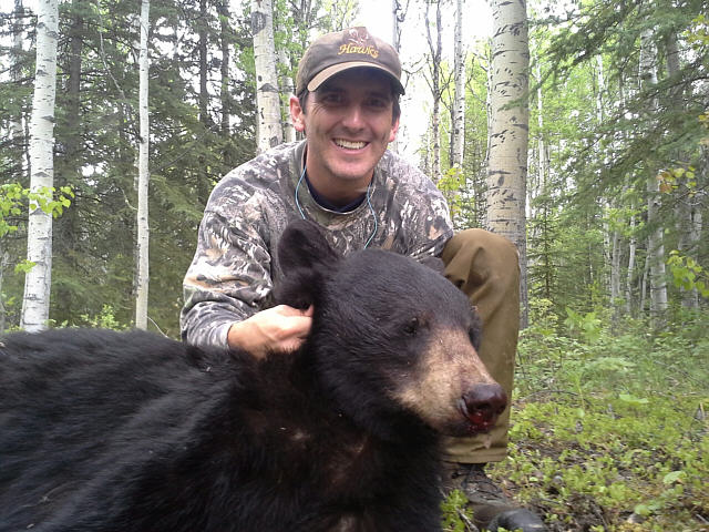Steve took time from his Ministry to hunt a bear at my camp.  HIs work delayed him from arriving on time so 2 days is all we had.  His first day of his spot and stalk hunt he nailed this guy.  A short run by the bear and it was on the ground for keeps.  As he called it, 