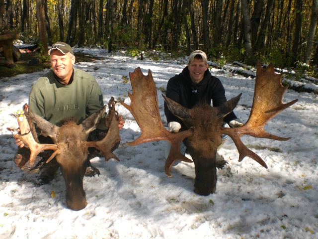 Among other large trophies taken on our late, Sept. moose hunt this photo shows the big and the small. Shawn and his son, Kyle proudly hold their moose for the camera. Kyle\'s moose measured 49.5 inches. Great guys to have in camp.