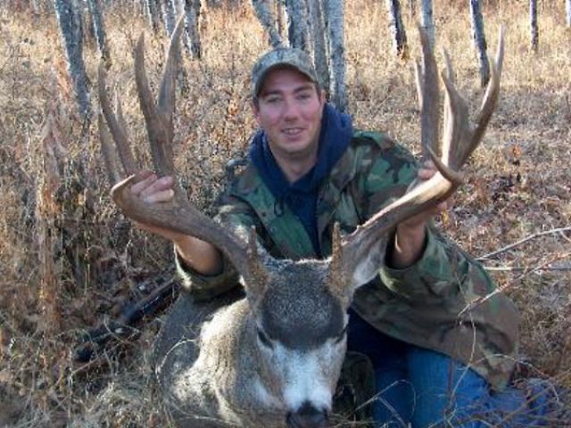 This 6 by 7 not counting brow tines is one heck of a buck. A score well over 210 with a spread of 34.5 inches is a trophy for anyone\'s wall. Sean\'s second buck and they just keep getting bigger. What can we get him next year that will out do this one? A great wall hanger. 