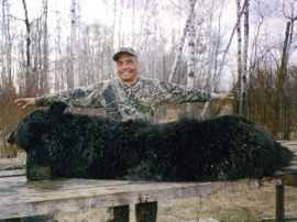 Wanting a huge bear for a hunting magazine, Ronald got his story and a 7 1/2 foot trophy, nose to tail. A thrilling adventure for Ronald and another big game story for Alberta Wilderness Adventures.