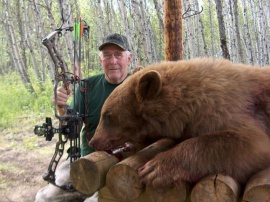 5 hunters took 10 bear in 5 days. All fair chase hunts. This non-baited archery hunter tagged two bear, a black and this brown. A pleasant hunter and an excellent shot. Mike proudly smiles while I photograph him and this excellent trophy.