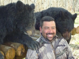 After a bad hunt the previous year with some other outfitter, Joey, started out with doubt but by the 3rd day of his non baited hunt he had his black bear. His second bear cinched up his confidence in bear outfitters and non baited hunts. His smiles between the bears shows of a good time.