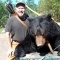 Recurve archery hunter, Gordon, shows off his huge non-baited trophy bear. For his own enjoyment he makes his own recurve bows. Precision in archery making, his bows are among the best I have ever seen. What a huge bear measuring 8 feet. 
