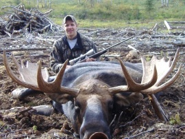 Check out the spread on this bull. Hard to find anywhere other than our hunting area. We took several bulls this season as large as Kyle's shown in this photograph. He has a trophy and a memory to last him for many years. We are so pleased to be able to provide trophies of this caliber.