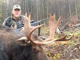 Art Bundy came back again to hunt with us for the fifth time this fall. He was searching for another moose to add to the moose he had taken the year before. He made a great shot from 375 yards on this nice moose. He has taken mule deer and bears on his moose hunts on previous trips and continues to hunt with us each year. He's a great hunter, and a great friend and we love having him return year after year.