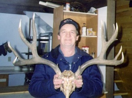 Outfitter, Louis Shilka, with his impressive mule deer buck. 29 inches wide with heavy beams is a trophy for his wall and hangs in the camp kitchen. 12 points with polished tips are a rare sight for Alberta mule deer. We are a hunting family and my son is also an outfitter.